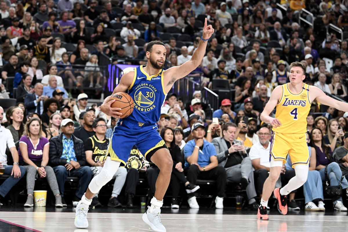 Oct 15, 2024; Las Vegas, Nevada, USA;  Golden State Warriors guard Stephen Curry (30) gestures to the bench against the Los Angeles Lakers in the fourth quarter of their preseason game at T-Mobile Arena. Mandatory Credit: Candice Ward-Imagn Images