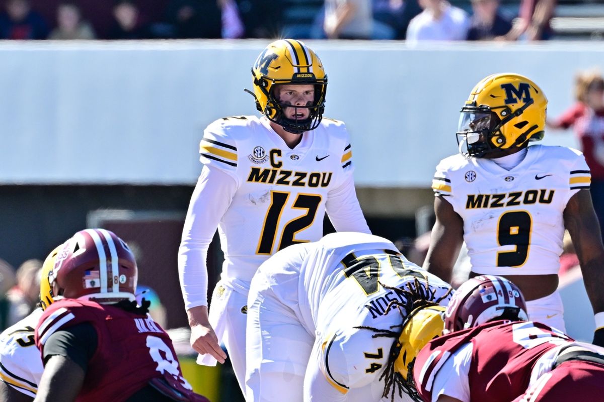 Oct 12, 2024; Amherst, Massachusetts, USA; Missouri Tigers quarterback Brady Cook (12)  waits for the snap of the ball during the first half against the Massachusetts Minutemen at Warren McGuirk Alumni Stadium. Mandatory Credit: Eric Canha-Imagn Images