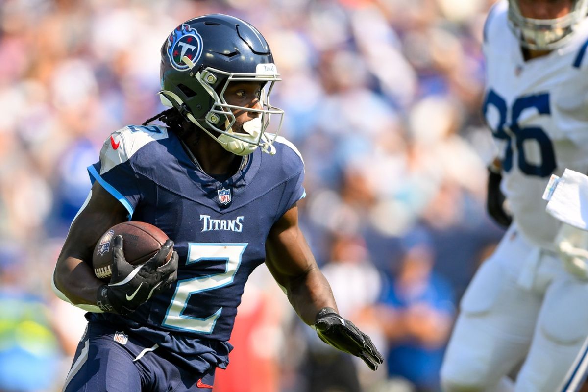 Oct 13, 2024; Nashville, Tennessee, USA;  Tennessee Titans running back Tyjae Spears (2) runs the ball against the Indianapolis Colts during the first half at Nissan Stadium. Mandatory Credit: Steve Roberts-Imagn Images