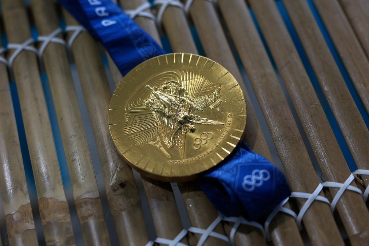 A gold medal from the 2024 Paris Olympics is displayed during a media tour Wednesday, Oct. 16, 2024 at the newly-opened Goldfish Swim School in St. Johns, Fla. Five-time Olympic gold medalist, Ryan Murphy, and parents Pat and Katy run the family-owned swim-teaching business. The new 8,600-square-foot state-of-the-art facility is geared for swimmers 4 months to 12 years old, though older first-time swimmers would be considered, according to Pat.
