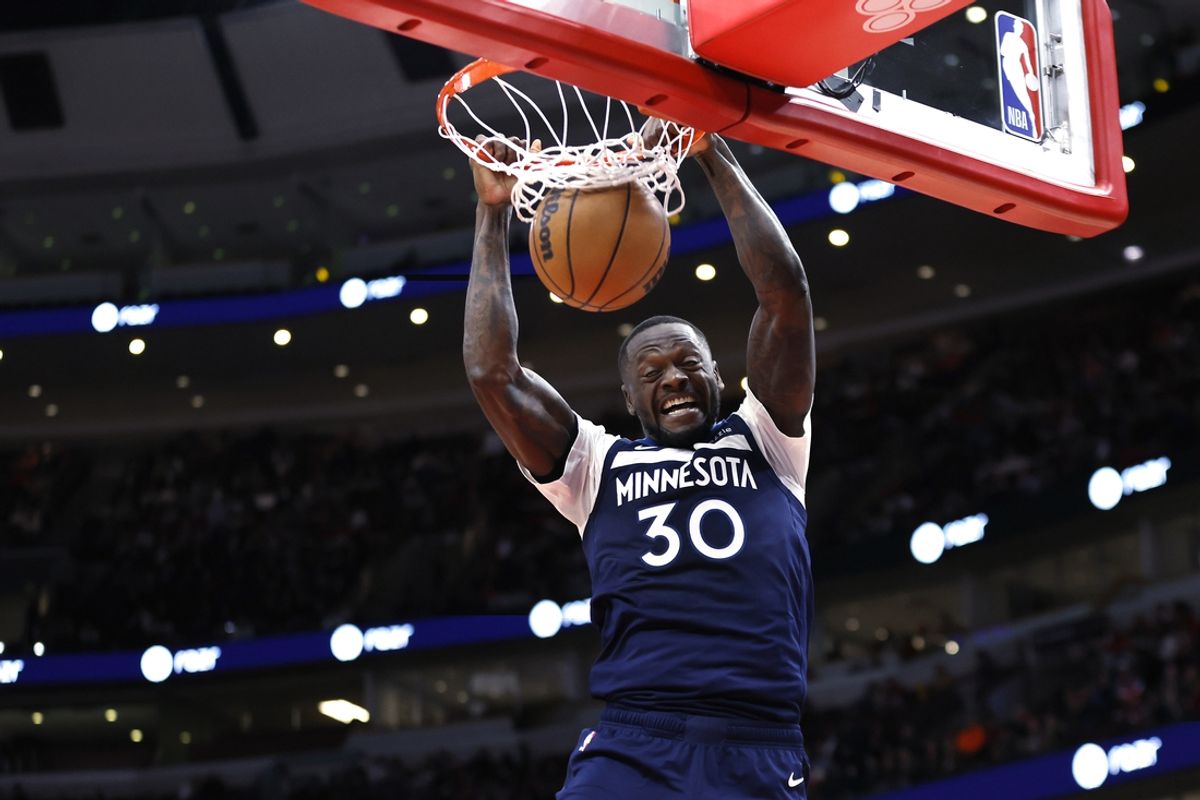 Oct 16, 2024; Chicago, Illinois, USA; Minnesota Timberwolves forward Julius Randle (30) scores against the Chicago Bulls during the first half at United Center. Mandatory Credit: Kamil Krzaczynski-Imagn Images