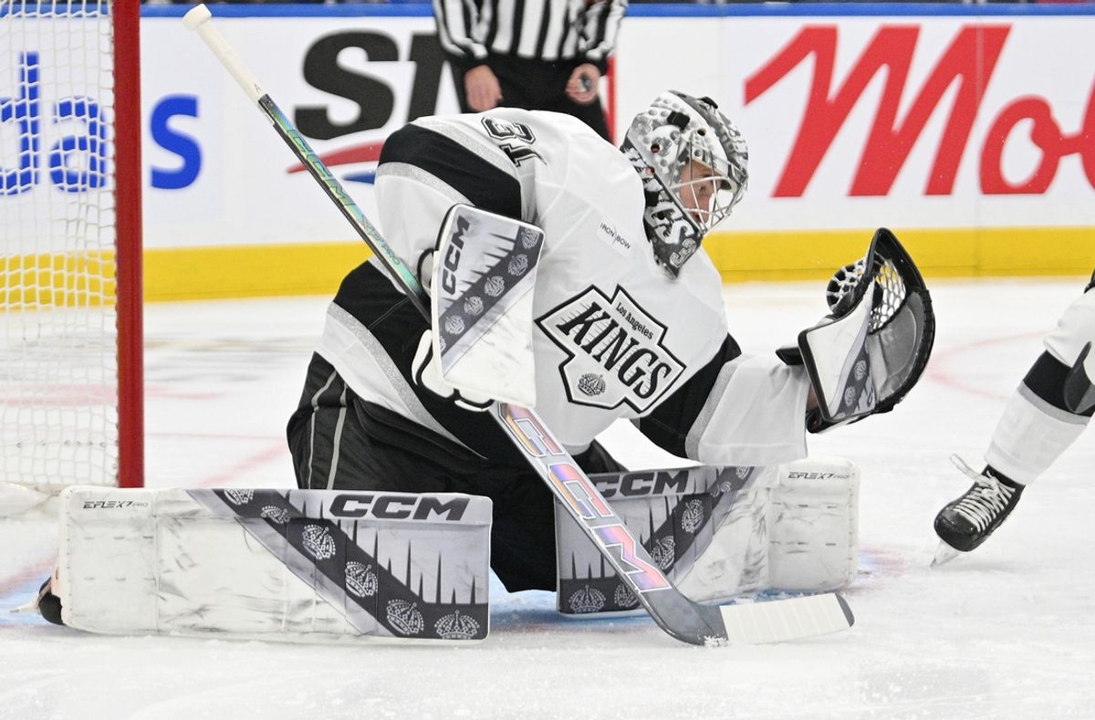 Oct 16, 2024; Toronto, Ontario, CAN;  Los Angeles Kings goalie David Rittich (31) makes a glove save against the Toronto Maple Leafs in the first period at Scotiabank Arena. Mandatory Credit: Dan Hamilton-Imagn Images