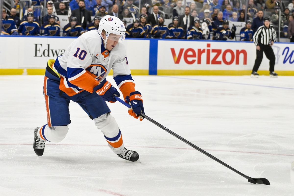 Oct 17, 2024; St. Louis, Missouri, USA;  New York Islanders right wing Simon Holmstrom (10) controls the puck against the St. Louis Blues during the first period at Enterprise Center. Mandatory Credit: Jeff Curry-Imagn Images