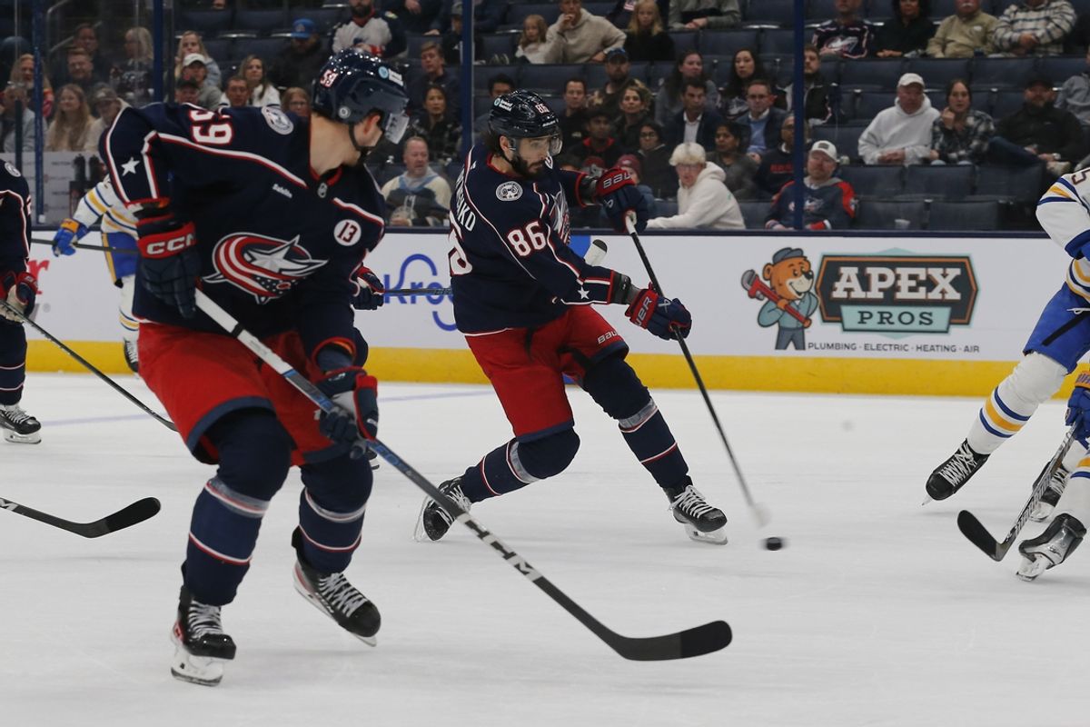 Oct 17, 2024; Columbus, Ohio, USA; Columbus Blue Jackets right wing Kirill Marchenko (86) wrists a shot on goal against the Buffalo Sabres during the second period at Nationwide Arena. Mandatory Credit: Russell LaBounty-Imagn Images