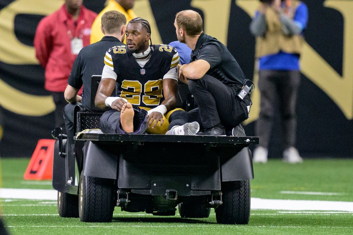 Oct 17, 2024; New Orleans, Louisiana, USA; New Orleans Saints cornerback Paulson Adebo (29) leaves the field with an injury during the second quarter against the Denver Broncos at Caesars Superdome. Mandatory Credit: Matthew Hinton-Imagn Images