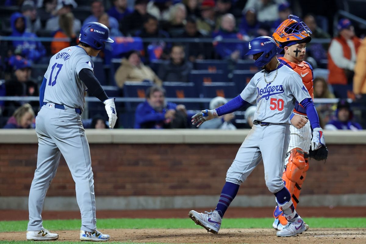 Oct 17, 2024; New York City, New York, USA; Los Angeles Dodgers shortstop Mookie Betts (50) reacts after hitting a two run home run against the New York Mets in the sixth inning during game four of the NLCS for the 2024 MLB playoffs at Citi Field. Mandatory Credit: Brad Penner-Imagn Images