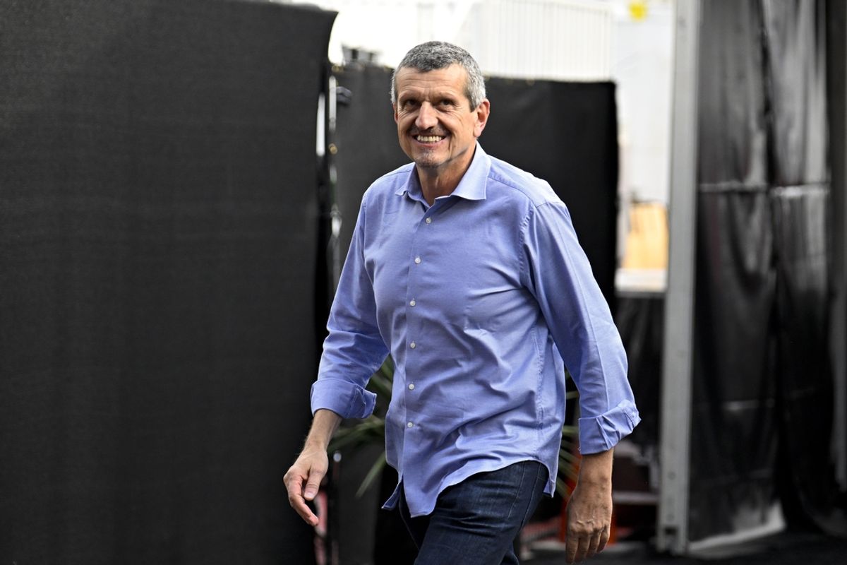 Oct 18, 2024; Austin, Texas, USA; Guenther Steiner walks through the track entrance before practice for the 2024 US Grand Prix at Circuit of the Americas. Mandatory Credit: Jerome Miron-Imagn Images