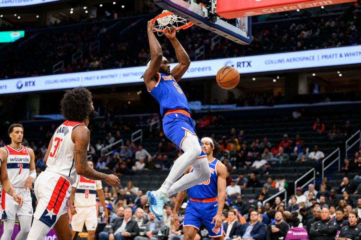 Oct 18, 2024; Washington, District of Columbia, USA; New York Knicks forward Precious Achiuwa (5) dunks the ball during the first quarter against the Washington Wizards at Capital One Arena. Mandatory Credit: Reggie Hildred-Imagn Images