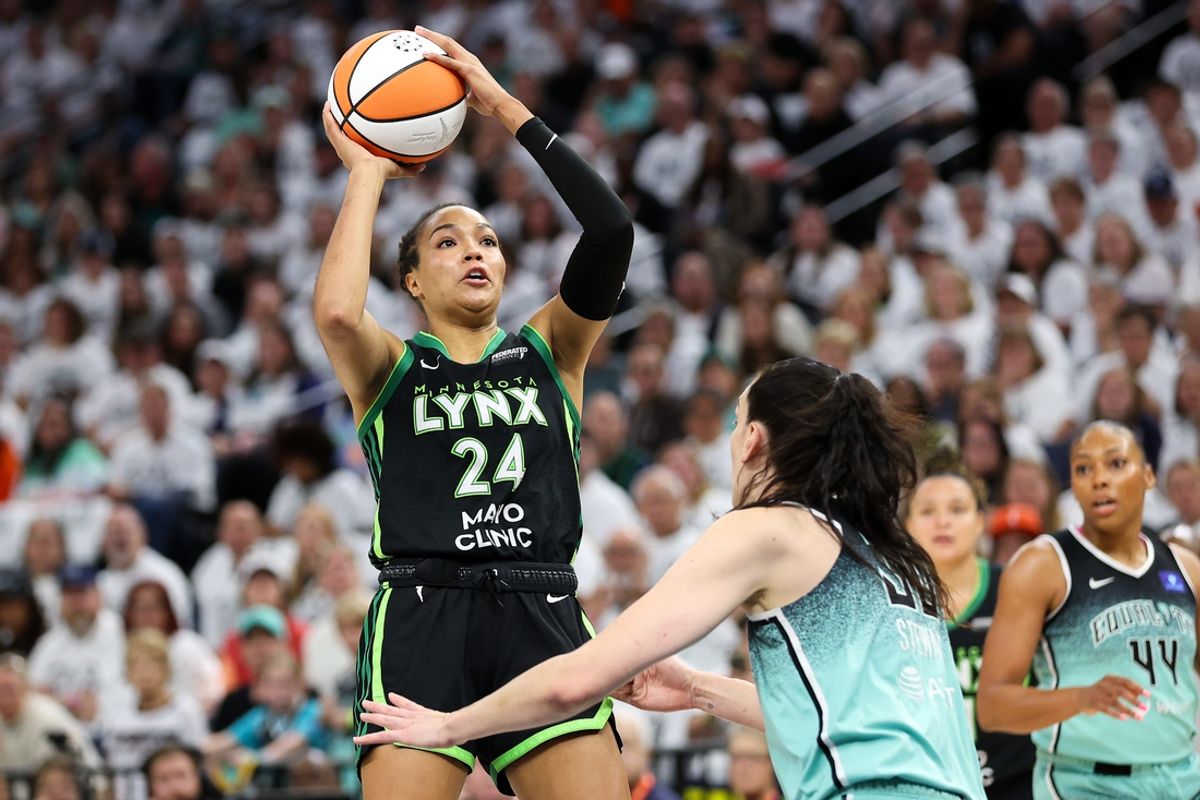 Oct 18, 2024; Minneapolis, Minnesota, USA; Minnesota Lynx forward Napheesa Collier (24) shoots over New York Liberty forward Breanna Stewart (30) during the first half of game four of the 2024 WNBA Finals at Target Center. Mandatory Credit: Matt Krohn-Imagn Images