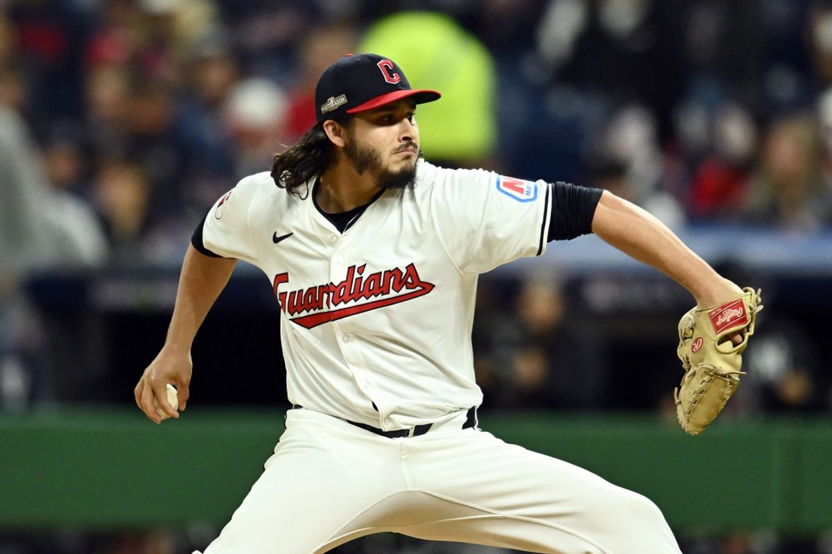 Oct 18, 2024; Cleveland, Ohio, USA; Cleveland Guardians pitcher Eli Morgan (49) pitches against the New York Yankees in the fifth inning during game four of the ALCS for the 2024 MLB playoffs at Progressive Field. Mandatory Credit: Ken Blaze-Imagn Images