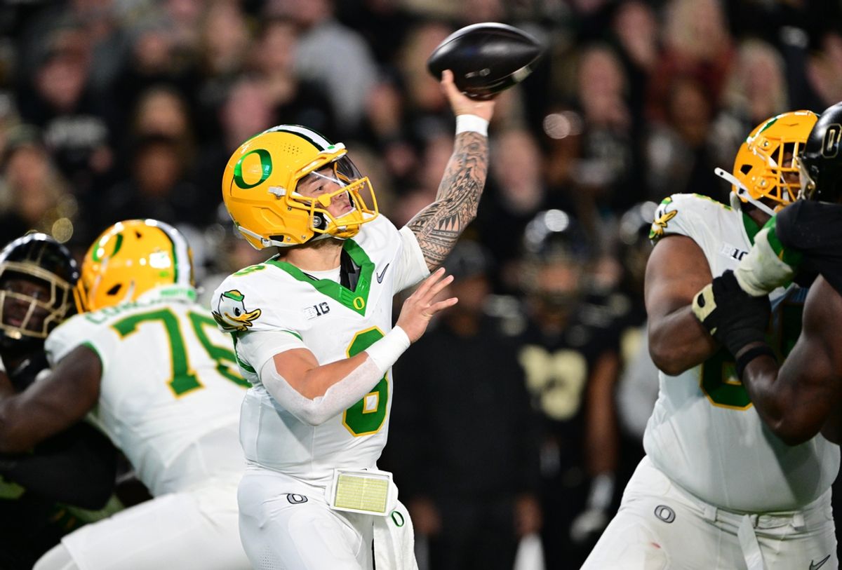 Oct 18, 2024; West Lafayette, Indiana, USA; Oregon Ducks quarterback Dillon Gabriel (8) throws a pass during the second quarter against the Purdue Boilermakers at Ross-Ade Stadium. Mandatory Credit: Marc Lebryk-Imagn Images