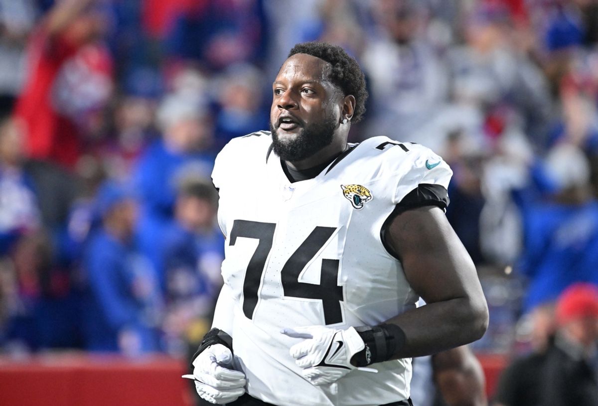Sep 23, 2024; Orchard Park, New York, USA; Jacksonville Jaguars offensive tackle Cam Robinson (74) enters the field before a game against the Buffalo Bills at Highmark Stadium. Mandatory Credit: Mark Konezny-Imagn Images