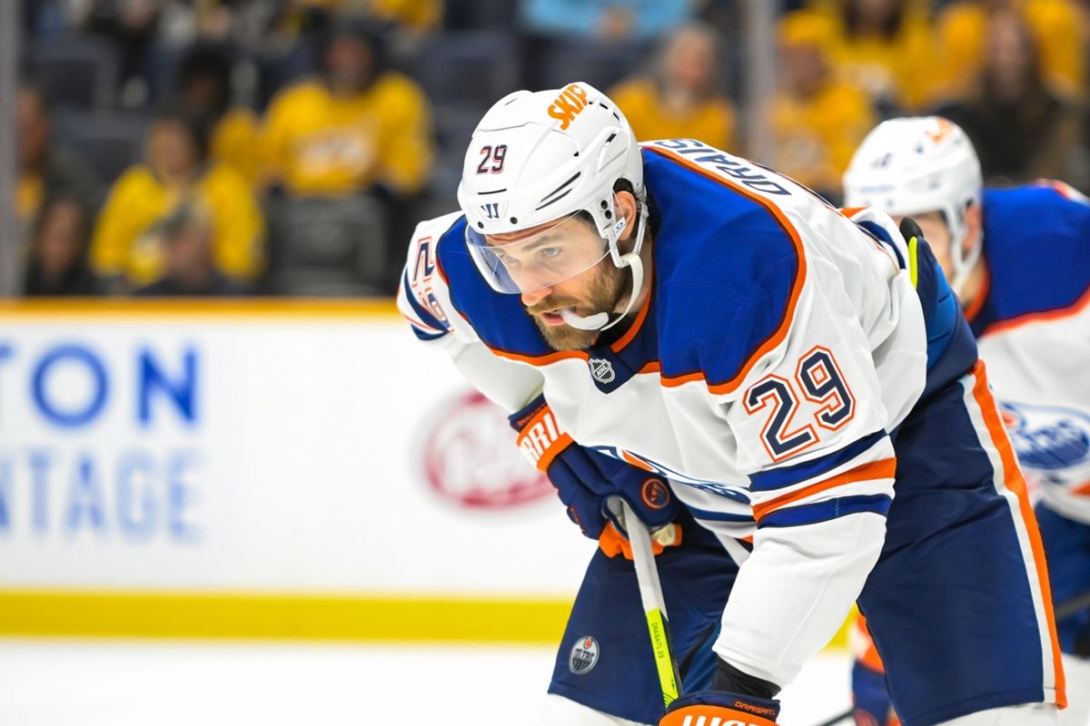 Oct 17, 2024; Nashville, Tennessee, USA;  Edmonton Oilers center Leon Draisaitl (29) awaits the face off against the Nashville Predators during the third period at Bridgestone Arena. Mandatory Credit: Steve Roberts-Imagn Images