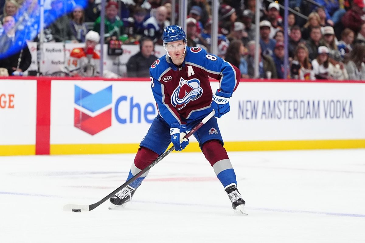 Oct 18, 2024; Denver, Colorado, USA; Colorado Avalanche defenseman Cale Makar (8) controls the puck in the second period against the Anaheim Ducks at Ball Arena. Mandatory Credit: Ron Chenoy-Imagn Images