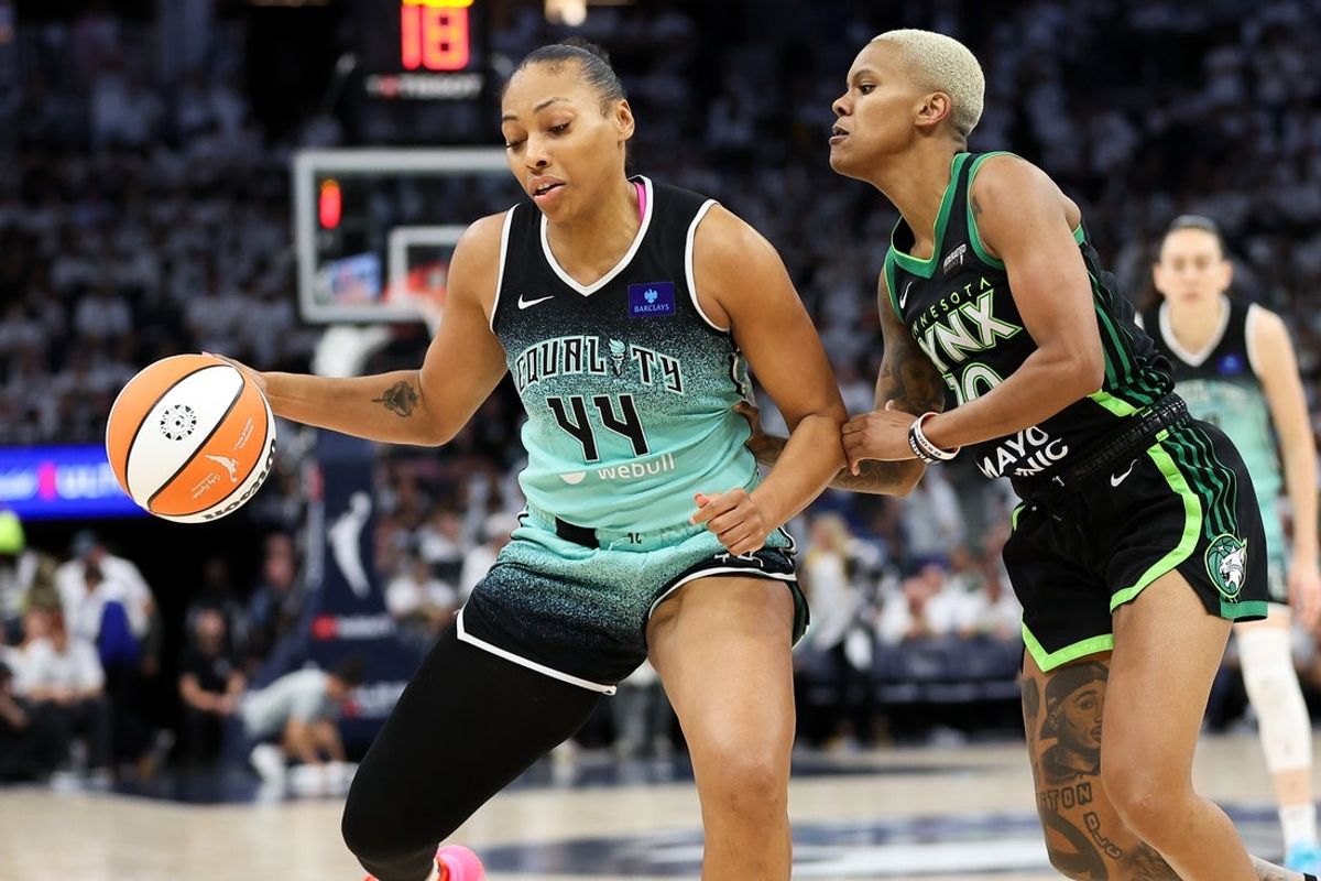 Oct 18, 2024; Minneapolis, Minnesota, USA; New York Liberty forward Betnijah Laney-Hamilton (44) drives past Minnesota Lynx guard Courtney Williams (10) during the second half of game four of the 2024 WNBA Finals at Target Center. Mandatory Credit: Matt Krohn-Imagn Images