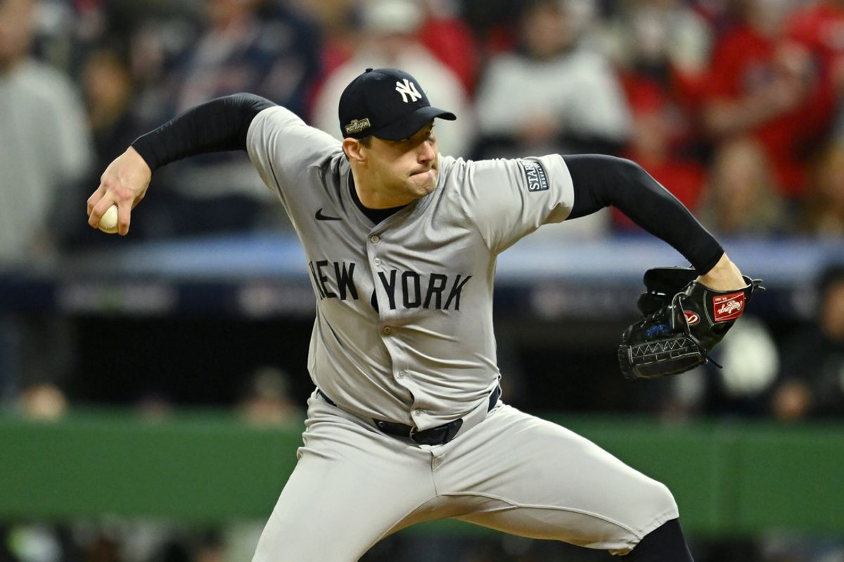 Oct 18, 2024; Cleveland, Ohio, USA; New York Yankees pitcher Tommy Kahnle (41) pitches in the ninth inning against the Cleveland Guardians during game four of the ALCS for the 2024 MLB playoffs at Progressive Field. Mandatory Credit: Ken Blaze-Imagn Images