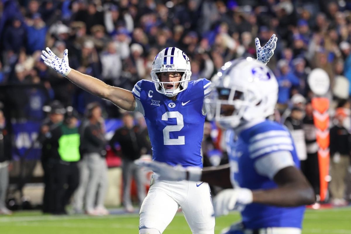 Oct 18, 2024; Provo, Utah, USA; Brigham Young Cougars wide receiver Chase Roberts (2) reacts to a touchdown against the Oklahoma State Cowboys during the fourth quarter at LaVell Edwards Stadium. Mandatory Credit: Rob Gray-Imagn Images