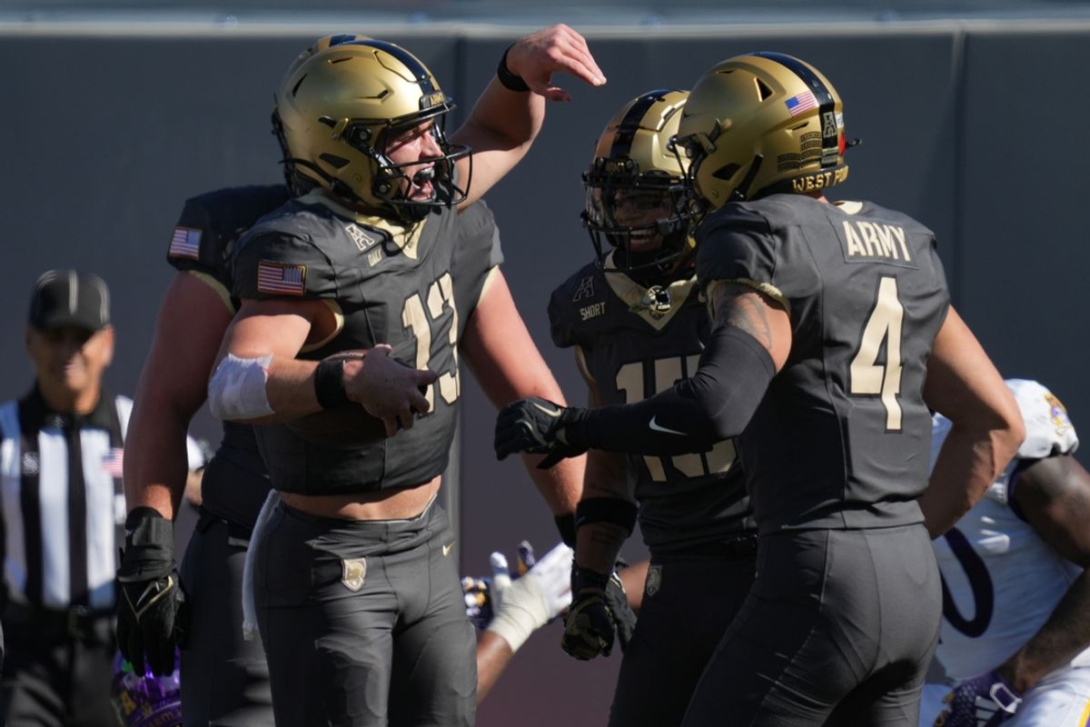 Oct 19, 2024; West Point, New York, USA; Army Black Knights quarterback Bryson Daily (13) celebrates after scoring a touchdown during the second quarter against the East Carolina Pirates at Michie Stadium. Mandatory Credit: Lucas Boland-Imagn Images