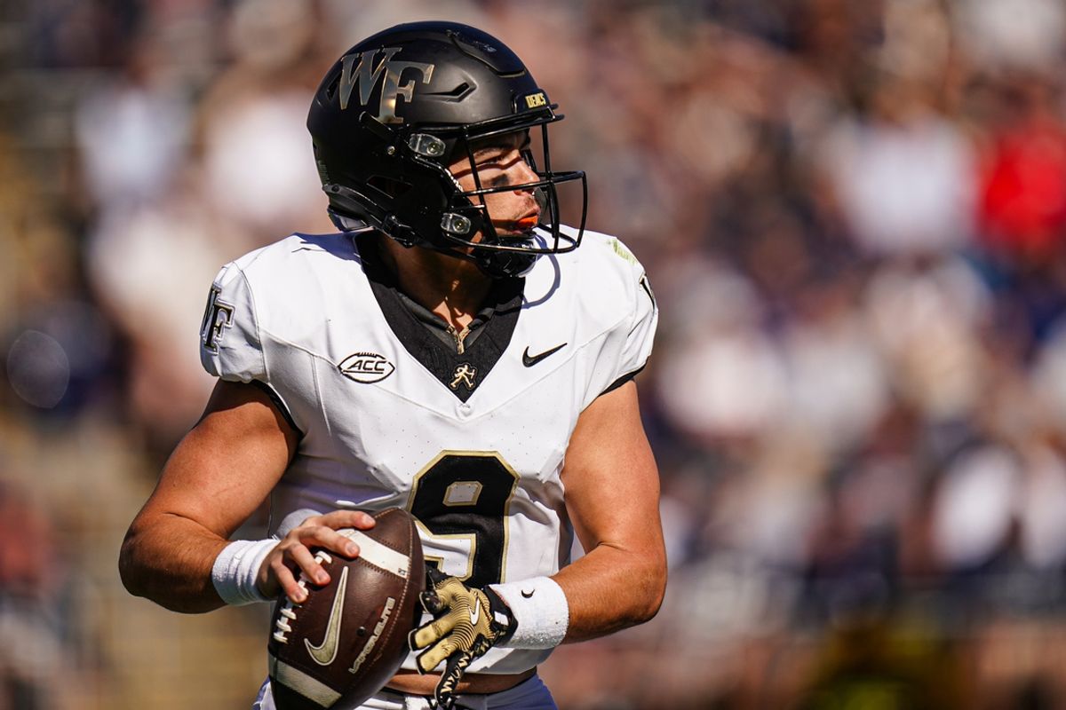 Oct 19, 2024; East Hartford, Connecticut, USA; Wake Forest Demon Deacons quarterback Hank Bachmeier (9) throws a looks to pass the ball against the Connecticut Huskies in the second quarter at Rentschler Field at Pratt & Whitney Stadium. Mandatory Credit: David Butler II-Imagn Images
