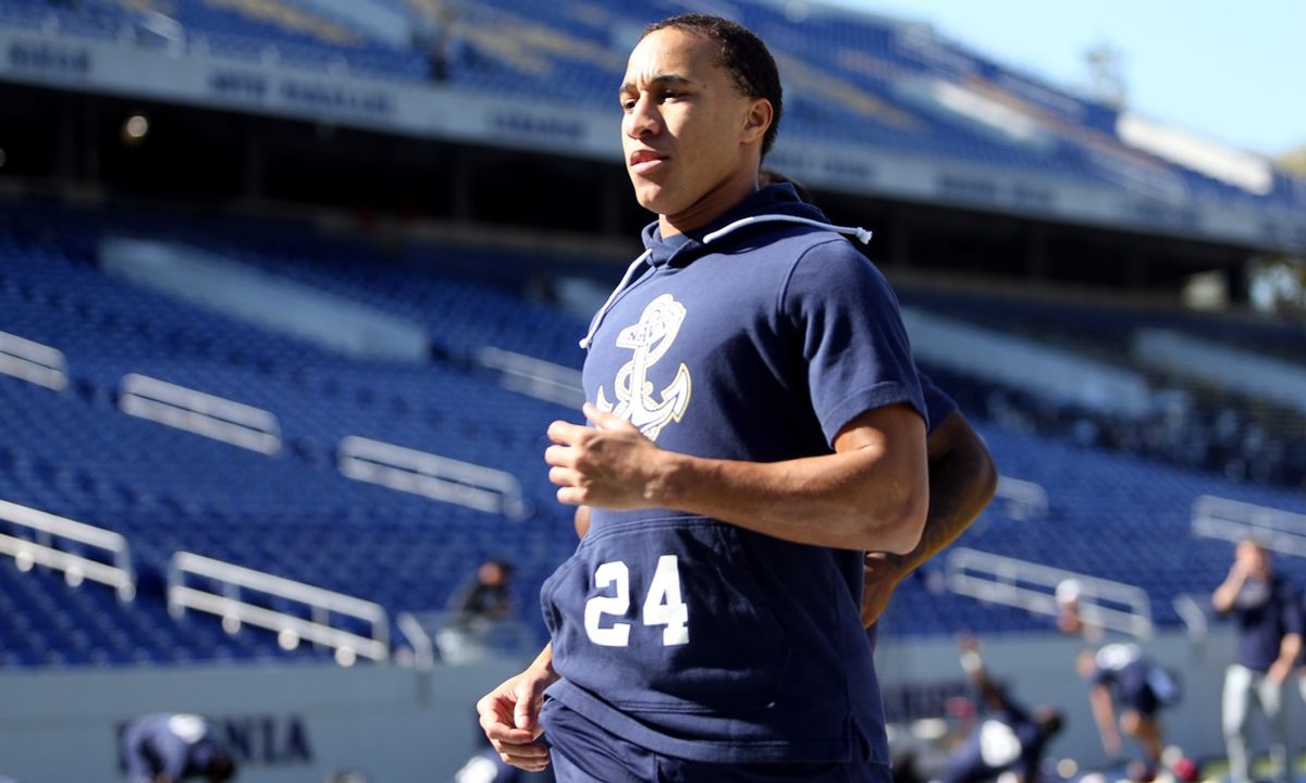 Oct 19, 2024; Annapolis, Maryland, USA; Navy Midshipmen running back Brandon Chatman (24) warms up before a game against the Charlotte 49ers at Navy-Marine Corps Memorial Stadium. Mandatory Credit: Daniel Kucin Jr.-Imagn Images