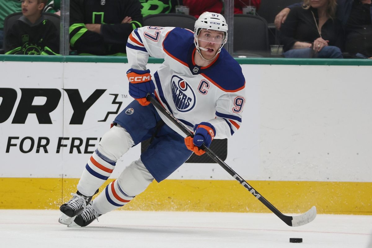 Oct 19, 2024; Dallas, Texas, USA; Edmonton Oilers center Connor McDavid (97) controls the puck against the Dallas Stars in the first period at American Airlines Center. Mandatory Credit: Tim Heitman-Imagn Images