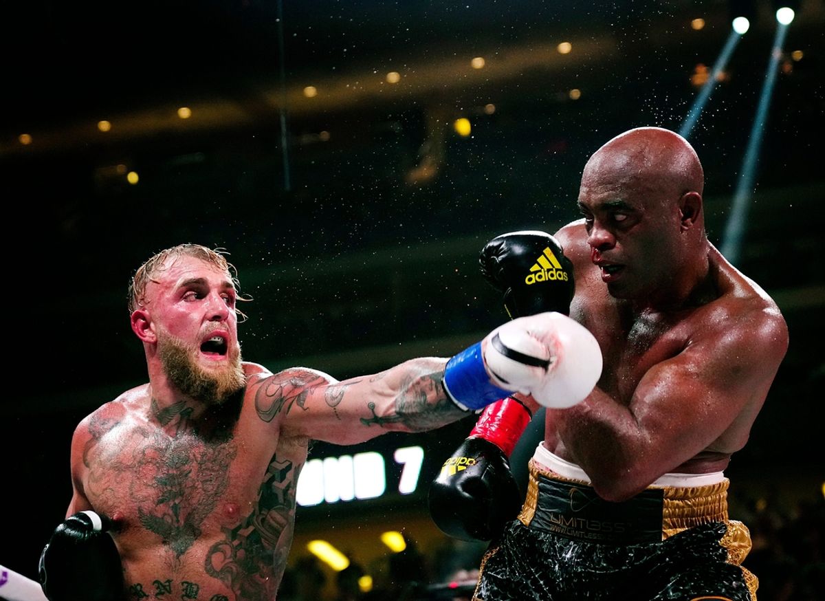 Jake Paul throws a punch at Anderson Silva during a bout at Desert Diamond Arena in Glendale, Ariz. on Oct. 29, 2022.