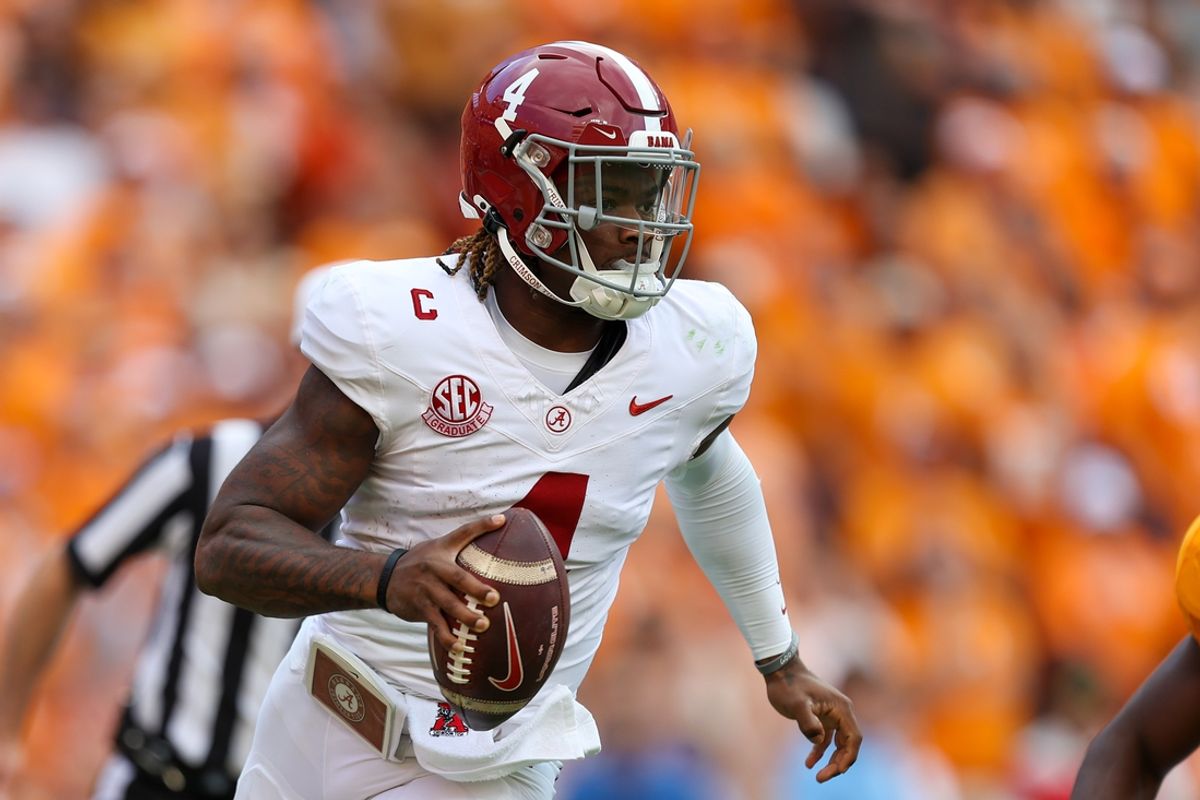 Oct 19, 2024; Knoxville, Tennessee, USA; Alabama Crimson Tide quarterback Jalen Milroe (4) scrambles against the Tennessee Volunteers during the second quarter at Neyland Stadium. Mandatory Credit: Randy Sartin-Imagn Images
