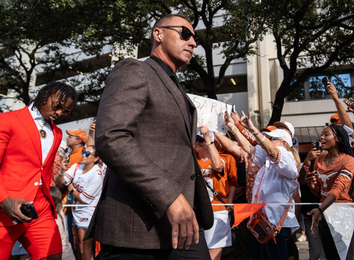 Oct 19, 2024; Austin, Texas, USA; Texas Longhorns head coach Steve Sarkisian walks down Bevo Boulevard and into the stadium before a game against the Georgia Bulldogs at Darrell K. Royal Texas Memorial Stadium. Mandatory Credit: Sara Diggins/USA TODAY Network via Imagn Images