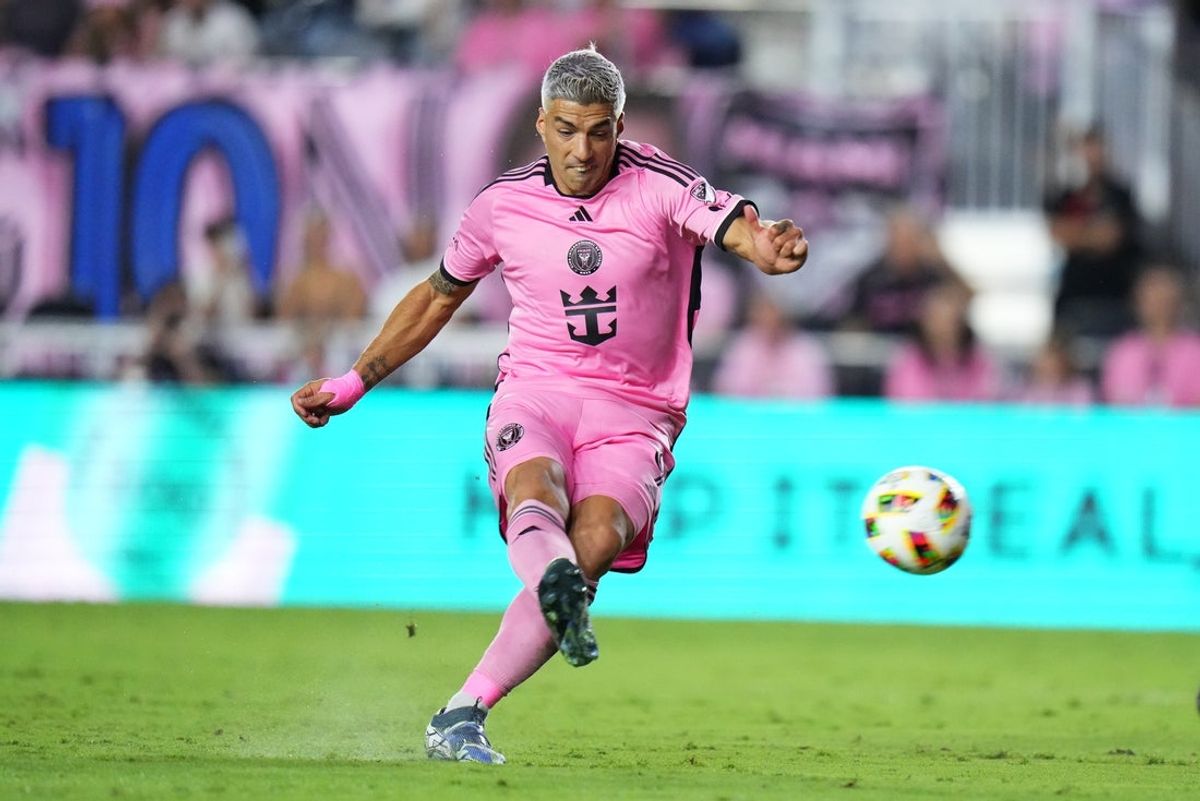 Oct 19, 2024; Fort Lauderdale, Florida, USA;  Inter Miami CF forward Luis Suarez (9) takes a free kick during the second half against the New England Revolution at Chase Stadium. Mandatory Credit: Rich Storry-Imagn Images