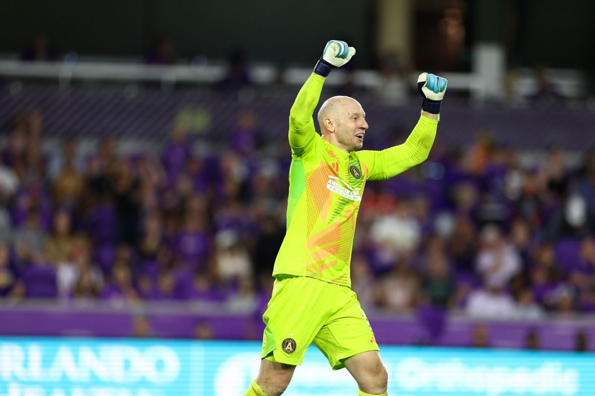 Oct 19, 2024; Orlando, Florida, USA; Atlanta United goalkeeper Brad Guzan (1) celebrates after beating Orlando City at Inter&Co Stadium. Mandatory Credit: Nathan Ray Seebeck-Imagn Images