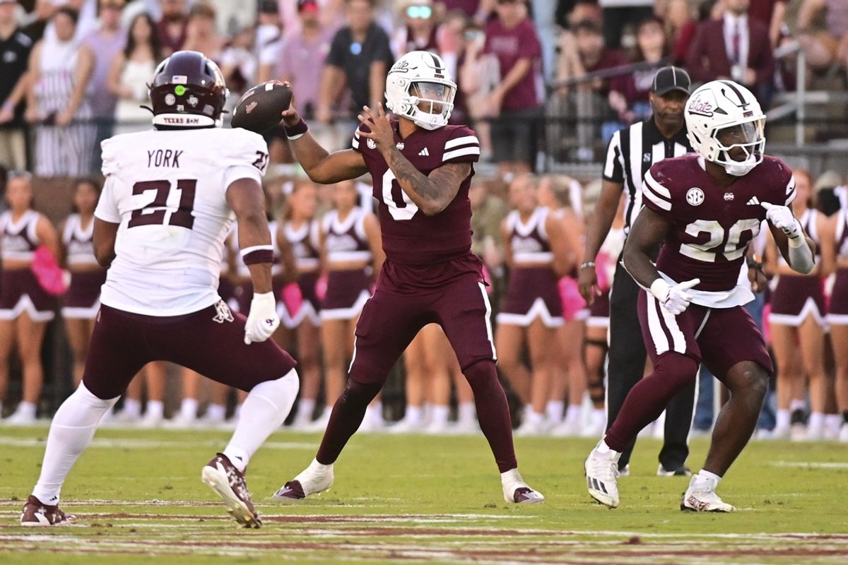 Oct 19, 2024; Starkville, Mississippi, USA; Mississippi State Bulldogs quarterback Michael Van Buren Jr. (0) throws a pass against the Texas A&M Aggies during the third quarter at Davis Wade Stadium at Scott Field. Mandatory Credit: Matt Bush-Imagn Images
