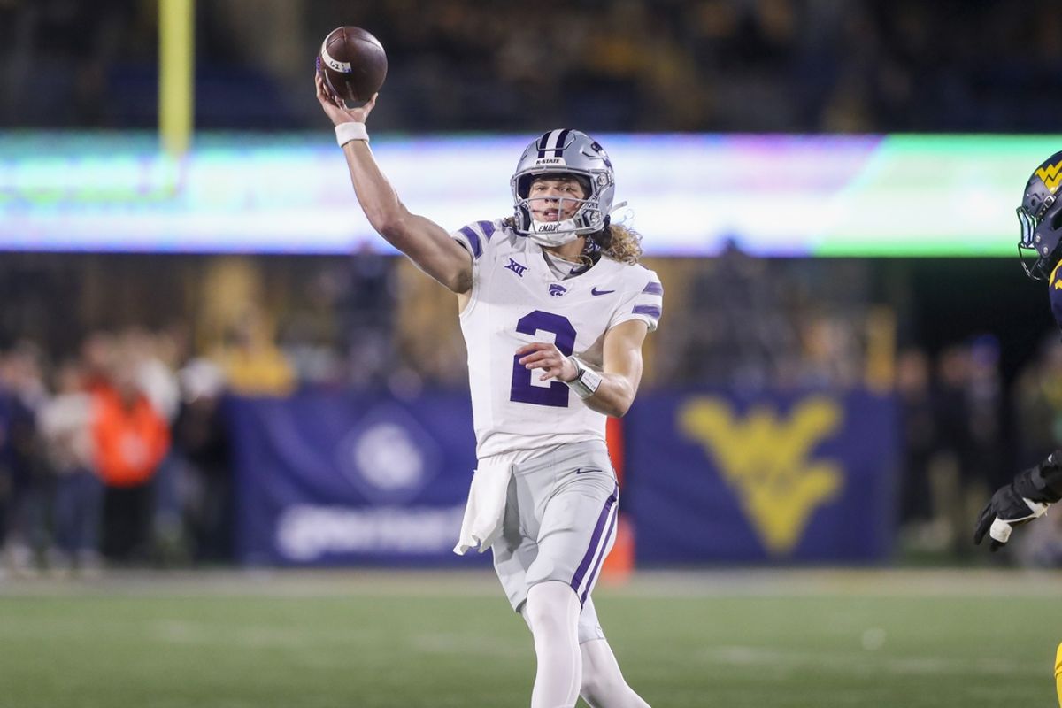 Oct 19, 2024; Morgantown, West Virginia, USA; Kansas State Wildcats quarterback Avery Johnson (2) throws a pass during the first quarter against the West Virginia Mountaineers at Mountaineer Field at Milan Puskar Stadium. Mandatory Credit: Ben Queen-Imagn Images