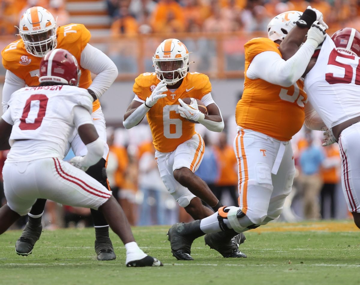 Oct 19, 2024; Knoxville, Tennessee, USA; Tennessee Volunteers running back Dylan Sampson (6) runs the ball against the Alabama Crimson Tide in the second quarter at Neyland Stadium. Mandatory Credit: Alan Poizner-Imagn Images