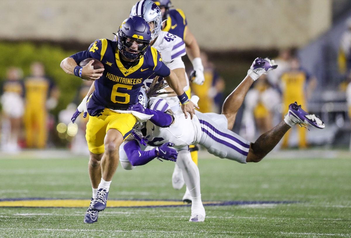 Oct 19, 2024; Morgantown, West Virginia, USA; West Virginia Mountaineers quarterback Garrett Greene (6) runs during the first quarter against the Kansas State Wildcats at Mountaineer Field at Milan Puskar Stadium. Mandatory Credit: Ben Queen-Imagn Images