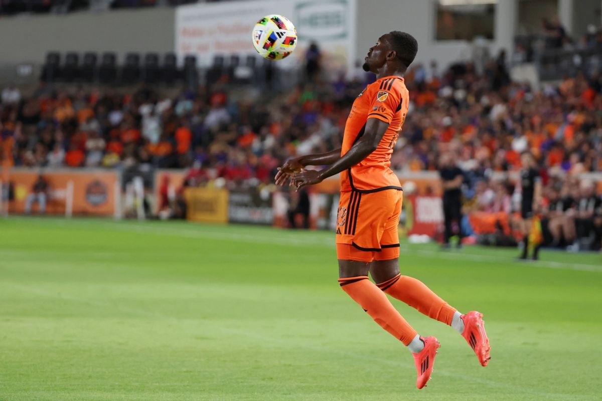 Oct 19, 2024; Houston, Texas, USA; Houston Dynamo FC forward Ibrahim Aliyu (18) controls the ball against the LA Galaxy during the first half at Shell Energy Stadium. Mandatory Credit: Thomas Shea-Imagn Images