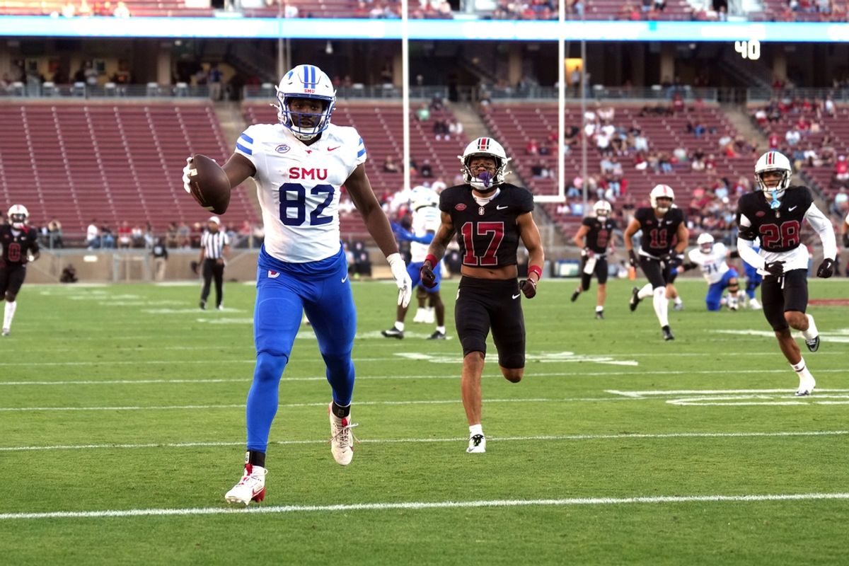 Oct 19, 2024; Stanford, California, USA; Southern Methodist Mustangs tight end RJ Maryland (82) scores a touchdown after a catch against the Stanford Cardinal during the first quarter at Stanford Stadium. Mandatory Credit: Darren Yamashita-Imagn Images