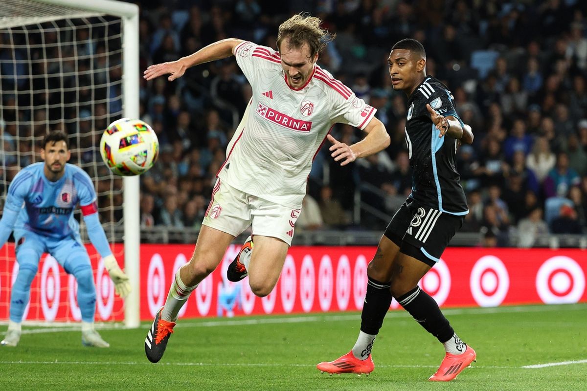 Oct 19, 2024; Saint Paul, Minnesota, USA; St. Louis CITY SC defender Henry Kessler (5) and Minnesota United midfielder Joseph Rosales (8) compete for the ball during the first half of the game at Allianz Field. Mandatory Credit: Matt Krohn-Imagn Images