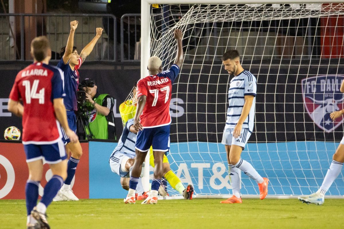 Oct 19, 2024; Frisco, Texas, USA; FC Dallas forward Bernard Kamungo (77) celebrates the Own Goal by Sporting Kansas City defender Joaquin Fernandez (24) at Toyota Stadium. Mandatory Credit: Joseph Buvid-Imagn Images