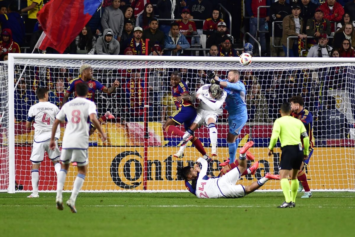 Oct 19, 2024; Sandy, Utah, USA; Real Salt Lake goalkeeper Zac MacMath (18) blocks a corner kick by Vancouver Whitecaps FC during the first half  at America First Field. Mandatory Credit: Peter Creveling-Imagn Images