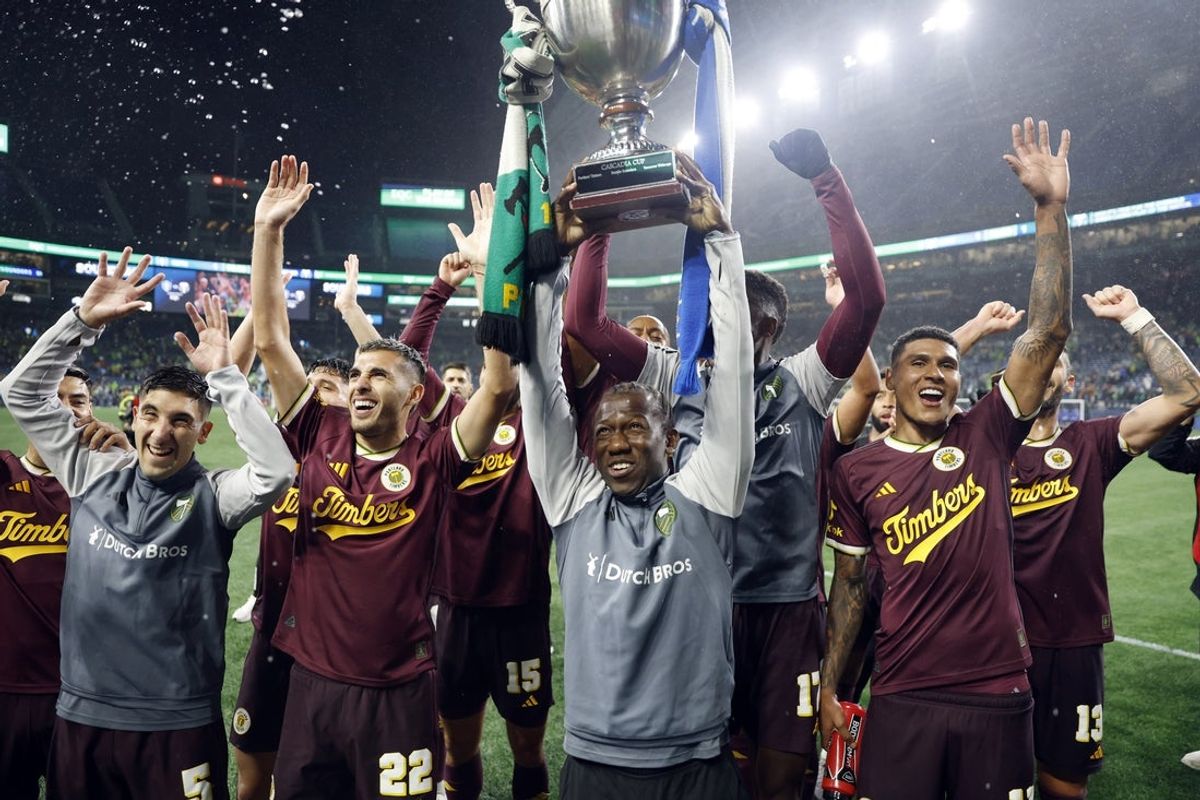 Oct 19, 2024; Seattle, Washington, USA; The Portland Timbers celebrate with the Cascadia Cup after the match against Seattle Sounders FC at Lumen Field. Mandatory Credit: Joe Nicholson-Imagn Images
