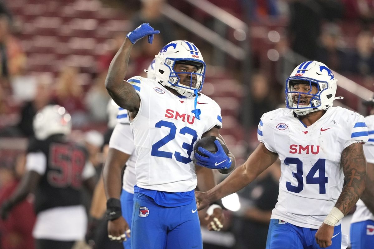 Oct 19, 2024; Stanford, California, USA; Southern Methodist Mustangs safety Isaiah Nwokobia (23) gestures after intercepting a pass against the Stanford Cardinal during the fourth quarter at Stanford Stadium. Mandatory Credit: Darren Yamashita-Imagn Images