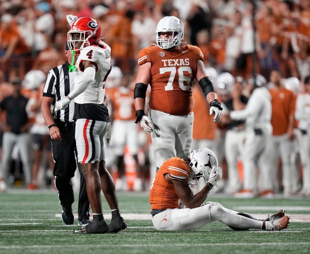 Texas Longhorns wide receiver Ryan Wingo is stopped by Georgia Bulldogs defensive back KJ Bolden short of a first down on a fourth down play late in the fourth quarter at Darrell K Royal-Texas Memorial Stadium Saturday October 19, 2024.