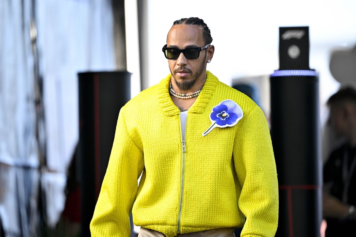 Oct 20, 2024; Austin, Texas, USA; Mercedes AMG Petronas F1 Team driver Lewis Hamilton (44) of Team Great Britain walks through the track entrance before the 2024 Formula One US Grand Prix at Circuit of the Americas. Mandatory Credit: Jerome Miron-Imagn Images