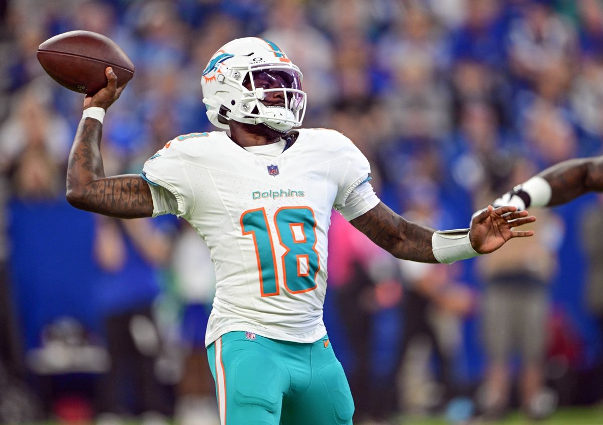 Oct 20, 2024; Indianapolis, Indiana, USA; Miami Dolphins quarterback Tyler Huntley (18) throws a pass during the first quarter against the Indianapolis Colts at Lucas Oil Stadium. Mandatory Credit: Marc Lebryk-Imagn Images