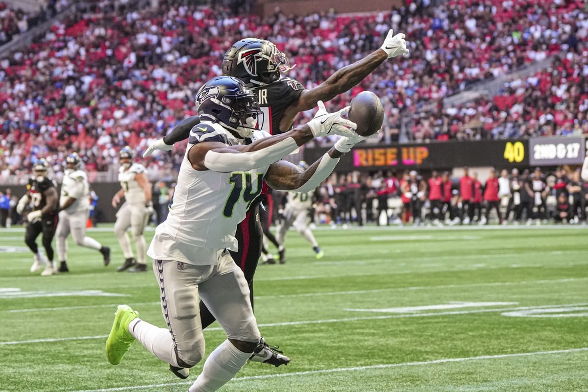 Oct 20, 2024; Atlanta, Georgia, USA; Seattle Seahawks wide receiver DK Metcalf (14) can not make a catch in the end zone defended by Atlanta Falcons cornerback A.J. Terrell (24) during the first quarter at Mercedes-Benz Stadium. Mandatory Credit: Dale Zanine-Imagn Images