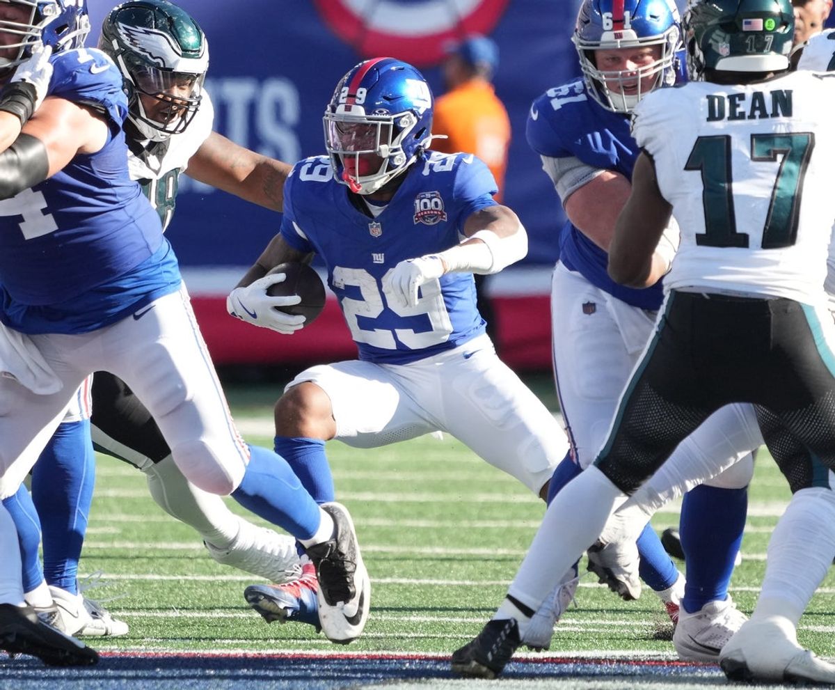Oct 20, 2024; East Rutherford, New Jersey, USA;  New York Giants running back Tyrone Tracy Jr. (29) runs against the Philadelphia Eagles during the second half at MetLife Stadium. Mandatory Credit: Robert Deutsch-Imagn Images