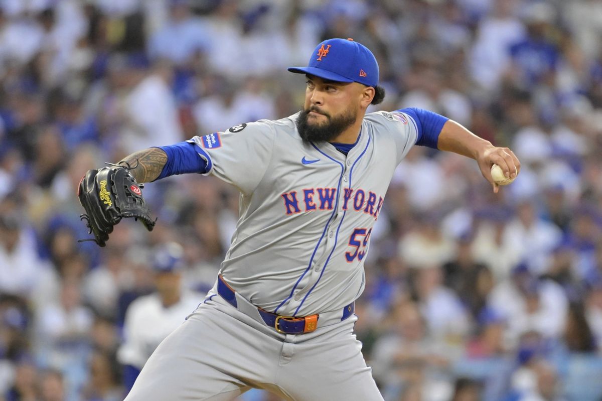 Oct 20, 2024; Los Angeles, California, USA; New York Mets pitcher Sean Manaea (59) pitches against the Los Angeles Dodgers in the second inning during game six of the NLCS for the 2024 MLB playoffs at Dodger Stadium. Mandatory Credit: Jayne Kamin-Oncea-Imagn Images