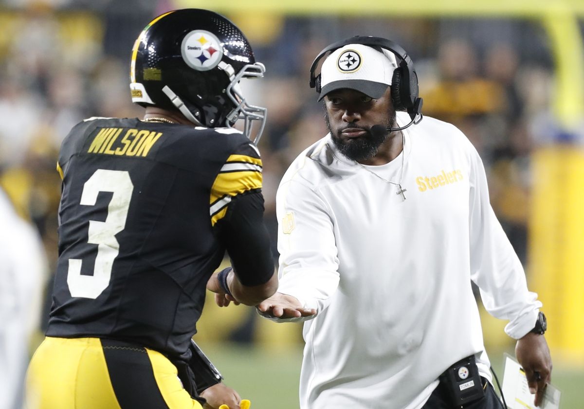 Oct 20, 2024; Pittsburgh, Pennsylvania, USA;  Pittsburgh Steelers head coach Mike Tomlin (right) congratulates quarterback Russell Wilson (3) on his touchdown pass against the New York Jets during the second quarter at Acrisure Stadium. Mandatory Credit: Charles LeClaire-Imagn Images