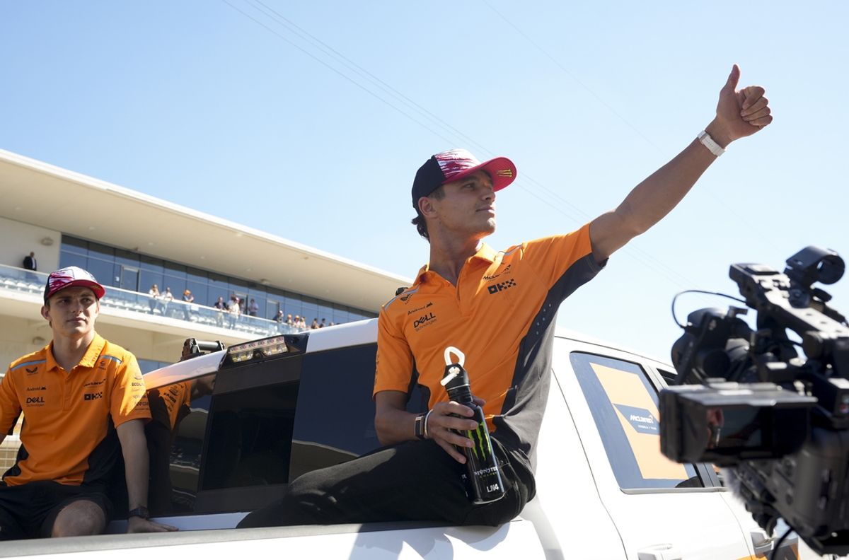 Oct 20, 2024; Austin, Texas, USA; McLaren Formula 1 Team driver Lando Norris of Team Great Britain waves to the crowd during the drivers parade at the Formula 1 Pirelli United States Grand Prix at Circuit of the Americas. Mandatory Credit: Jay Janner-Imagn Images