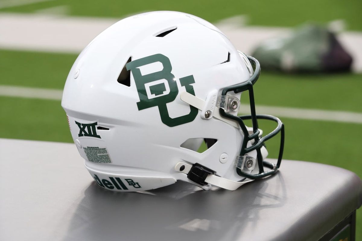 Oct 19, 2024; Lubbock, Texas, USA;  A general view of a Baylor Bears helmet on the sidelines before the game against the Texas Tech Red Raiders at Jones AT&T Stadium and Cody Campbell Field. Mandatory Credit: Michael C. Johnson-Imagn Images